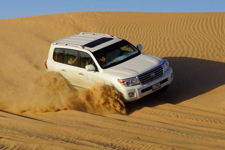Experience the rush of dune bashing in a powerful vehicle surrounded by endless golden sands as you create unforgettable memories under the Dubai sky. Escape into the wild!